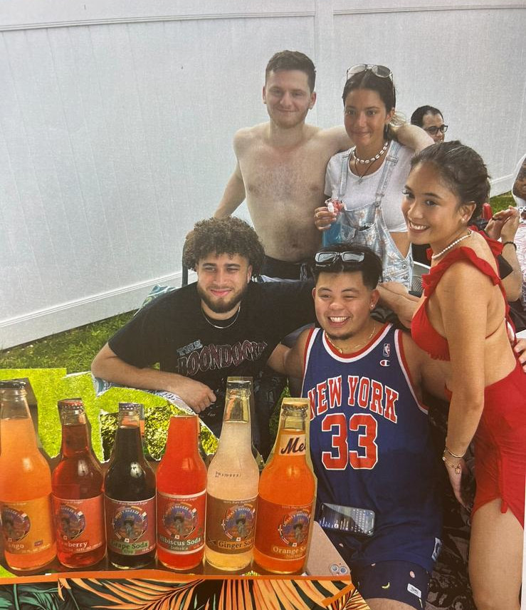 Group enjoying soda at a vibrant NYC street festival